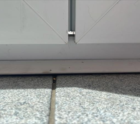 Finesse Window Systems Australia - Campbellfield, VIC. Gaps at both the top and bottom of the door