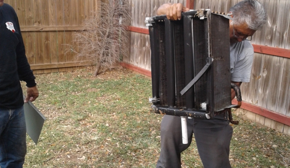 C& B ELECTRIC & A/C SERVICES - Mcallen, TX. cleaning a coil from ac unit my worker rogelio and freddy