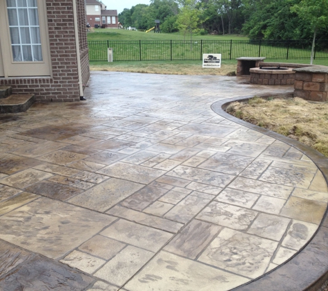 Walkers Concrete - Goshen, OH. Stamped Concrete Patio with Seating Wall, Columns and Fire Pit. Cincinnati Ohio