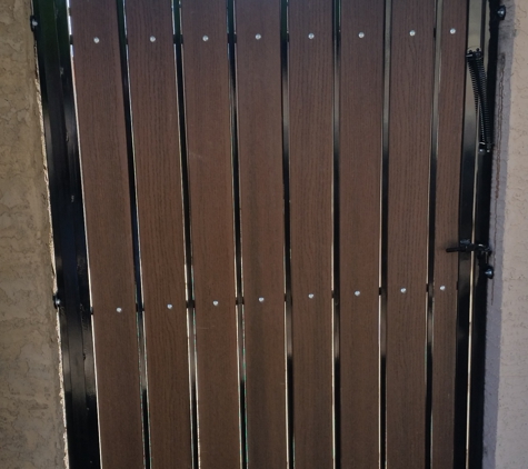 Building Block Masonry - Phoenix, AZ. 4 ft wide self closing gate with composite wood slats