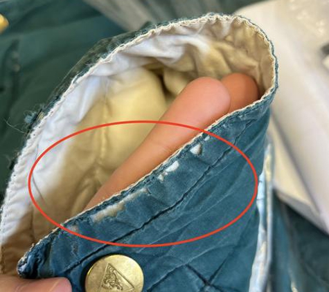 Synergy Dry Cleaning & Laundry Services - Wollongong, NSW. The pre-existing damage, which they spun as the zipper was damaged on receipt too