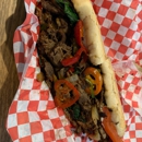 Slice of Martinez Pizza and Cheesesteaks - Pizza
