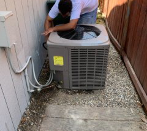 AC Repair Team - Concord, CA. Air Conditioner Repair guy replacing my AC compressor in Concord