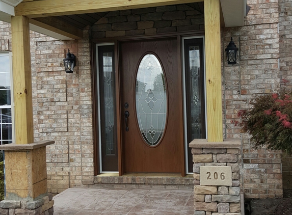Windows R Us - Steubenville, OH. New porch construction complete with stone work, tile and new door with opening side-lites
