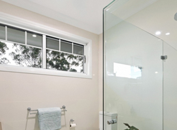 Bradnam's Windows & Doors - Kensington, QLD. Frameless Shower Screen - Corner Configuration