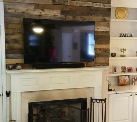 Cowboy Builds, Inc - Kennesaw, GA. Pallet wood mantle accent wall by Cowboy Jeff