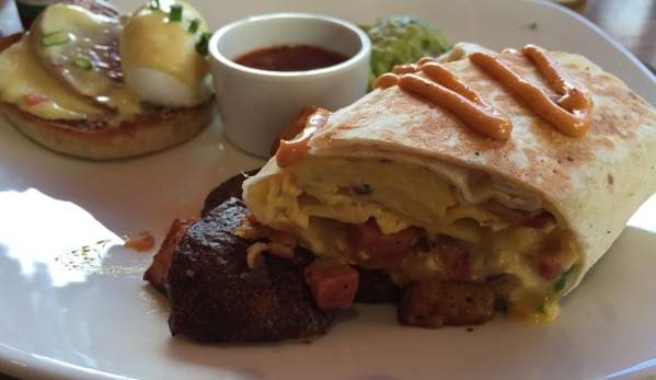Hula Grill Waikiki - Honolulu, HI. Big kahuna burrito and Portuguese sausage egg benedict