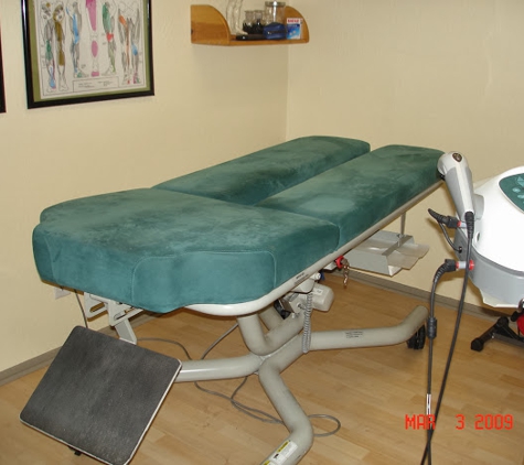 Dr. Donald H. Dearth, DC - Tempe, AZ. Automatic table used in the office allows the patient to get into treatment position easily.