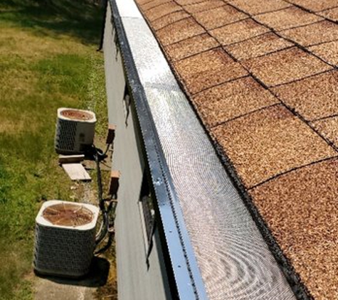 First Class Gutters - Providence, RI. pine needle protection gutter covers