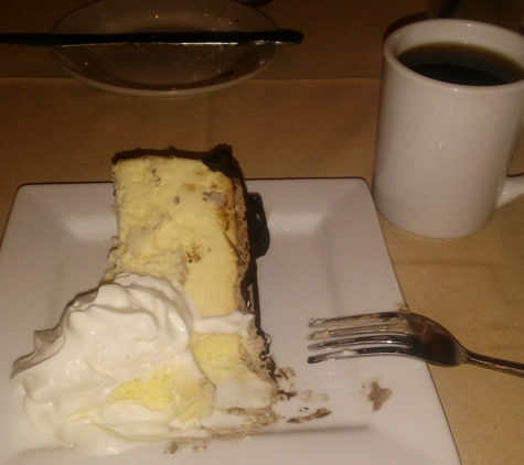 Peppers By Amedeo's Restaurant & Bar - King Of Prussia, PA. cheesecake w/ fading whip cream.
