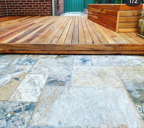 Bailey Trade Services/BTS Sealing - Woollahra, NSW. Before and after shots of our travertine and dirty, mouldy retaing walls