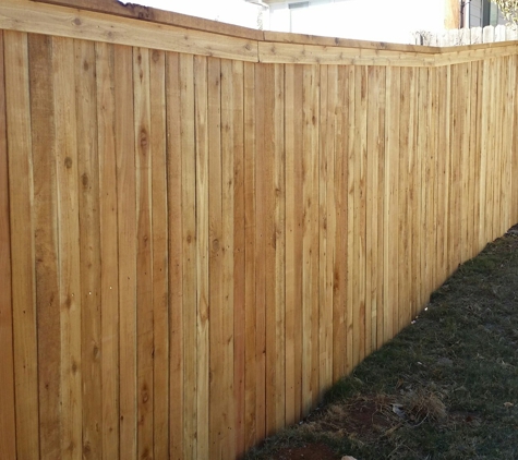 JM Fences - North Richland Hills, TX. Side by side white wood stained.  Treated cap and trim . Jm Fences