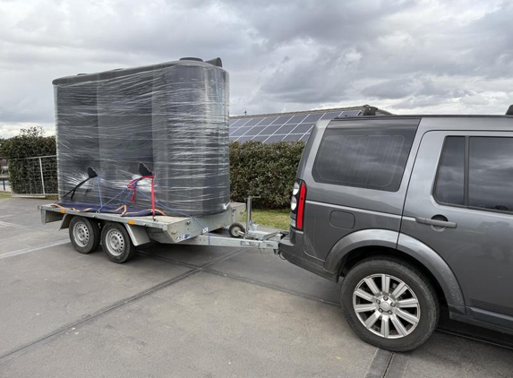 A2B Trailers - Erina, NSW. Here carrying a 5,000L poly water tank