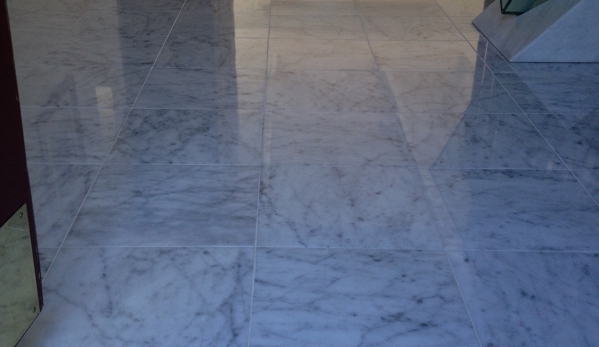 Da Vinci Stone Restoration - Branford, CT. Carrara marble foyer entry marble floor.