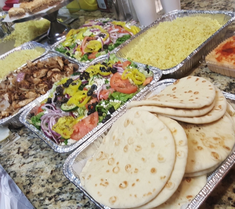 Greek Cafe - Nashville, TN. pool party $9 per person.including your choice of meat, rice,salad,pita&dressing,