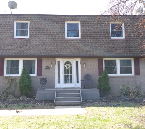 Saber Soft Wash - Jackson, MI. After roof cleaning