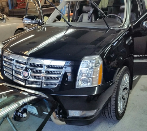 Strictly Auto Glass - Bloomfield, NJ. 2011 Cadillac Escalade windshield replacement.