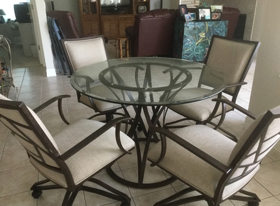 Downtown Used Furniture Inc - Daytona Beach, FL. 42" GLASS TOP TABLE WITH 4 TAUPE COASTER CHAIRS. LIKE NEW; ORIG PRICE & $2000. NEED TO SELL.