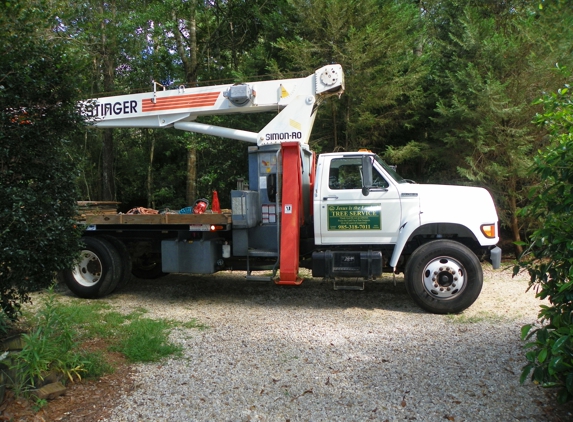 McCraney Tree Service. crane truck McCraney uses