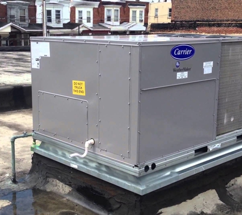 Green Home Solutions Heating and Cooling, Insulation - Cleveland, OH. A successful commercial Carrier Unit rooftop installation.