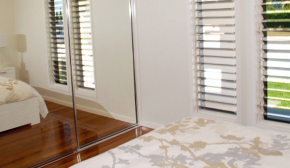 Bradnam's Windows & Doors - Bungalow, QLD. Sliding Wardrobe Door With Mirror Inserts
