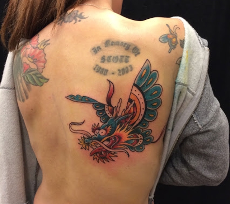 Grinn & Barrett Tattoo and Piercing - Omaha, NE