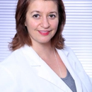 Dr. Olga Beckinger, DDS - Dentists