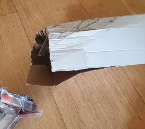 Couriers Please Pty Ltd - Rosehill, NSW. Damaged packaging as received from couriers please.
