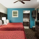 Days Inn & Suites by Wyndham Houston North Spring - Motels