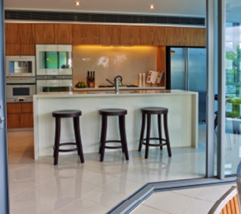Bradnam's Windows & Doors - Gladstone Central, QLD. Ultra Silver Aluminium Corner Sliding Door