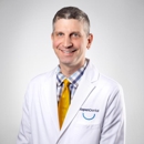 John Machi - Dental Clinics