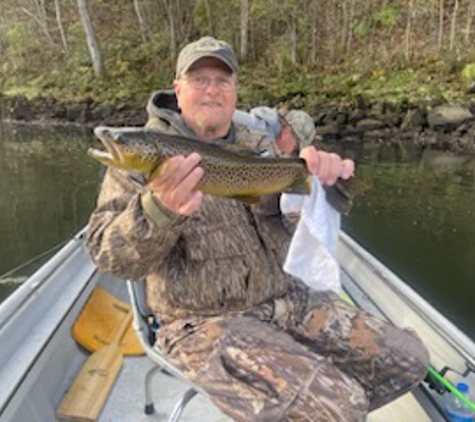 Cox's Guide Service - Lakeview, AR. Big Brown trout on a great fall day!