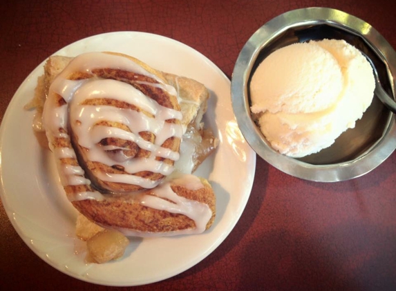 The Loving Pie Company - Nashville, TN. Cinnamon Roll topped Apple Pie! It's like two desserts in one!