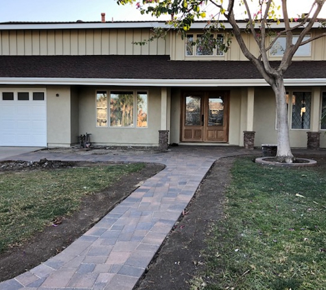 Salinas Landscaping & Tree Preservation Inc. - Los Angeles, CA. Paint done front doors being worked on and those brown old ones will be gone