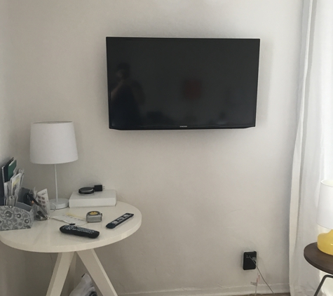 Pro TV Wall Mount Installation - Hollywood, CA. Our tv mounted perfectly with no wires showing what so ever!!!!