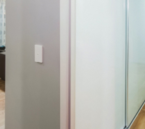 Bradnam's Windows & Doors - Emerald, QLD. Sliding Wardrobe Door In Hallway