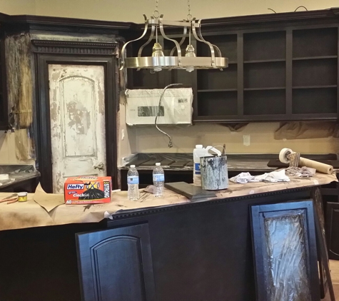 Orion Construction/Development - Linn, TX. Re-staining kitchen cabinets