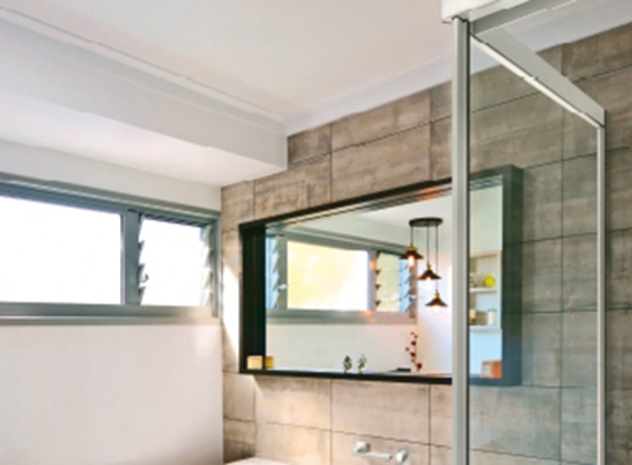 Bradnam's Windows & Doors - Gladstone Central, QLD. White Sliding Shower Screen