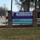 Nell's Wigs & Boutique - Clothing Stores