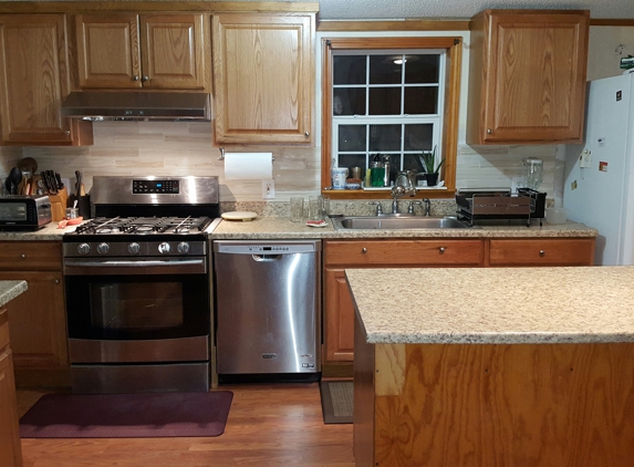 Orlando Contracting - Manchester, NH. Kitchen Design and Remodel done by Orlando Contracting using 2020 Kitchen Design. Limited space but worked out well.