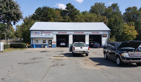 Alexander's Automotive & Towing - Clemmons, NC. We work on all makes and models of cars and trucks. All of our work is guaranteed. We fill gas grill propane tanks do NC state inspections.