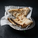 Taj Indian Cuisine & Bar - Restaurants
