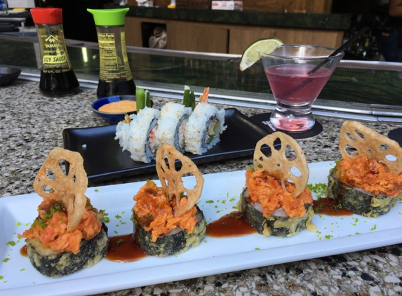 Ra Sushi - Atlanta, GA. Shrimp tempura, viva roll and a cosmopolitan. All items in the happy hour menu.