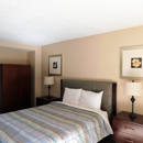 APM Inn & Suites - Hotels