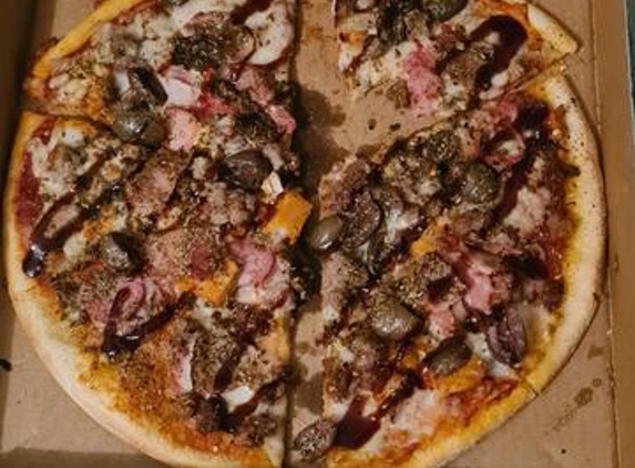Domino's Pizza - Grafton, NSW. Cheese hidden under toppings on Cheese free pizza.