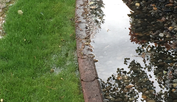 Badillo's Landscaping - Yakima, WA. Flooding throughout lawn