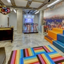 TWELVE at U District - Furnished Apartments