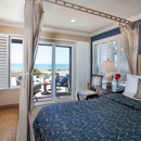 Blue Dolphin & Sand Pebbles Inn - Motels