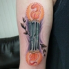 Evolution Tatoo gallery