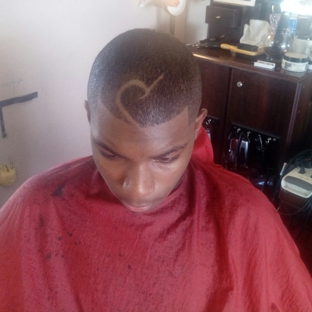 Castro's Cutz Barber shop - Clearwater, FL. Baldfade with the hook